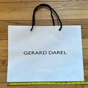 Gerard Darel reusable shopping bag. Thick paper.